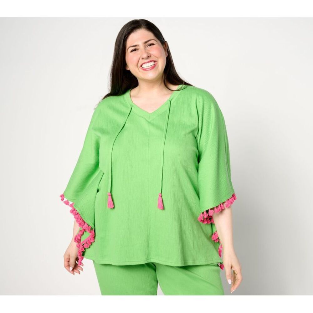 Bernini Women's Top Sz S Packabelle Take Me Away Tassel Trim Poncho Green